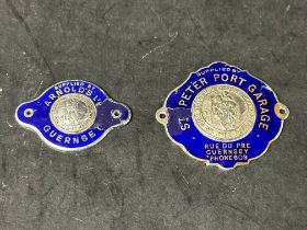 Two enamel supplier dashboard plaques, badges, emblems for Guernsey garages.