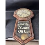 A Diamond Black Leather Oil advertising clock for T. Globe Oil Co.