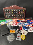 A selection of John Player Special 1980s memorabilia, 36 badges inc. Formula 1 World Champion, Grand