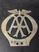An AA car badge, no. 597374, modified with new drill holes, dates June-Dec 1926