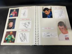 An album containing 22 autographs of Indy/CART Grand Prix Drivers including Patrick Le Marie,