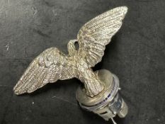 A contemporary car mascot in the form of an eagle.