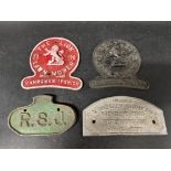 Three cast iron and an aluminium agricultural plaques inc. Ransomes and F.W. Wheatley Trailers.
