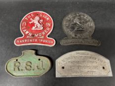 Three cast iron and an aluminium agricultural plaques inc. Ransomes and F.W. Wheatley Trailers.