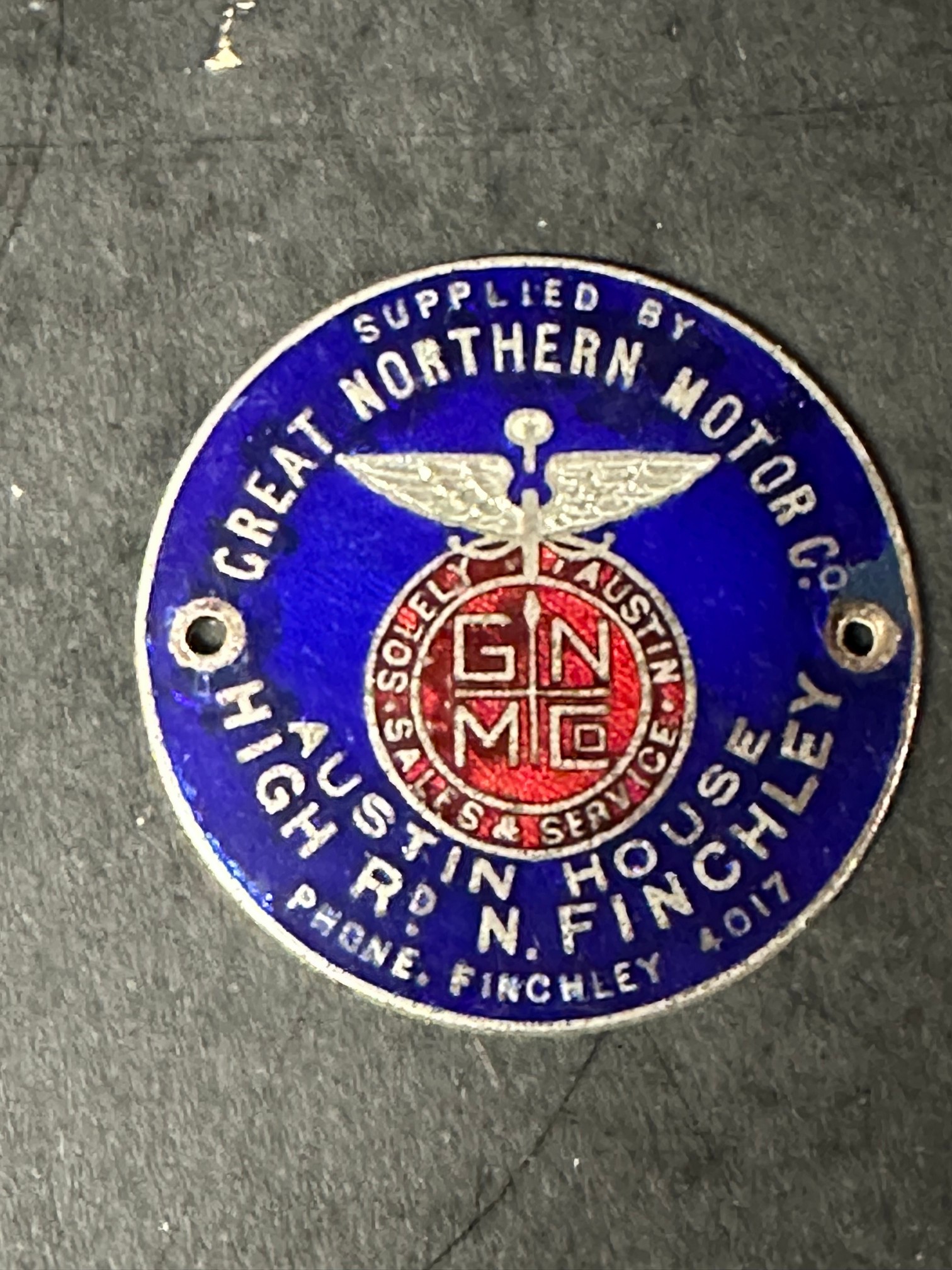 An enamel supplier dashboard plaque, badge, emblem for Austin House, Finchley dealer: Great Northern