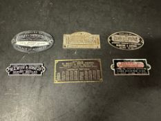 Six garage supplier plates, badges, plaques, emblems.