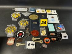 An autojumbler's lot inc. AA badges, keyrings etc.