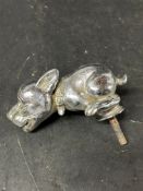 A Telcote Pup car accessory mascot with registration number to base: 692556.