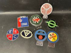 Eight assorted car badges inc. Austin 7, British Field Sports Society etc.