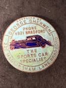 An enamel supplier's dashboard plaque, badge, emblem for George Sherwen, Bradford 'The Sports Car