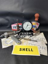 A mixed lot comprising a pressure gauge, railway wagon plate, a Riley car grille badge, petrol