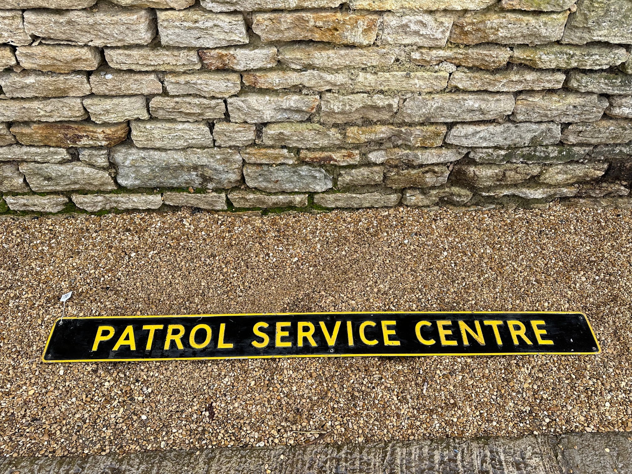 A Patrol Service Centre tin sign by Hills, Staines, London, 63 x 5 1/2"