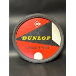 A Dunlop Cycle Tyres advertising board within tyre, 26 1/4" diameter.