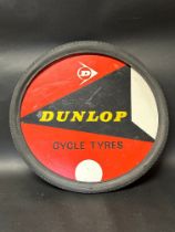 A Dunlop Cycle Tyres advertising board within tyre, 26 1/4" diameter.