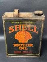 A Shell Motor Oil half gallon can.