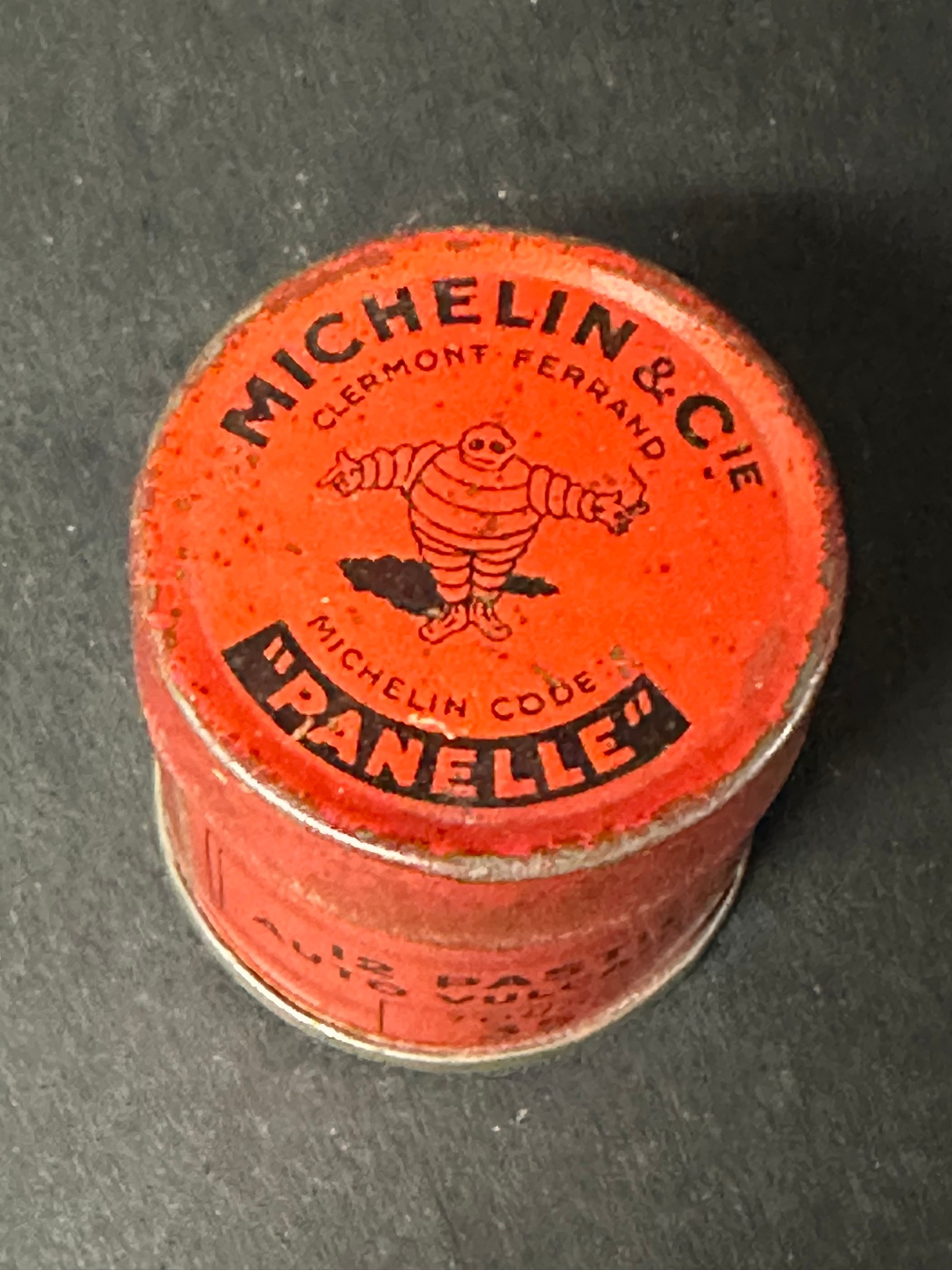 A Michelin & Cie "Panelle" miniature cylindrical tin for 12 Auto Valcanisantes Pastilles, 1 1/2"