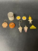 A selection of promotional garage-related items including badges, keyrings etc. Shell, BP,