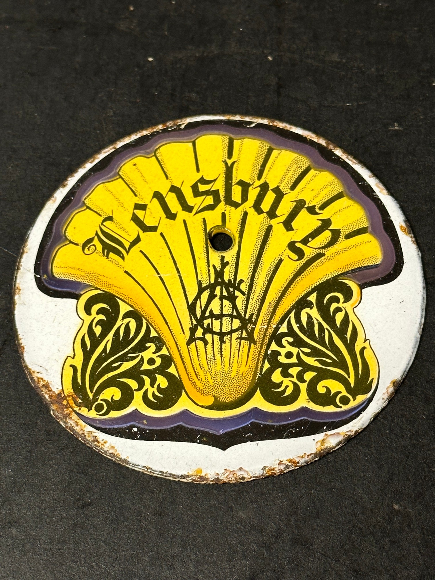 A 1920s Shell 'Lensbury' circular enamel car badge, 4" diameter.