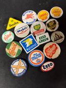 16 assorted petrol/motor related badges, mostly celluloid for brands including Shell, Amoco, BP,