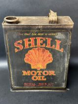 A Shell Motor Oil half gallon can lacking cap and with broken handle.