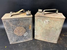 A Shell two gallon petrol can with Shell cap and one other with National Benzole Mixture cap.