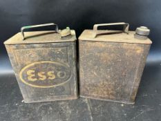 An Esso two gallon can with Esso cap and one other.