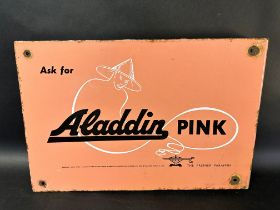 An Aladdin Pink 'The Premier Paraffin' double sided enamel advertising sign with image of genie