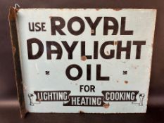 A Royal Daylight Oil enamel advertising sign with hanging flange, 'for lighting heating cooking', 22