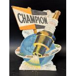 A Champion Spark Plugs counter top display showcard, 13 1/2" tall.