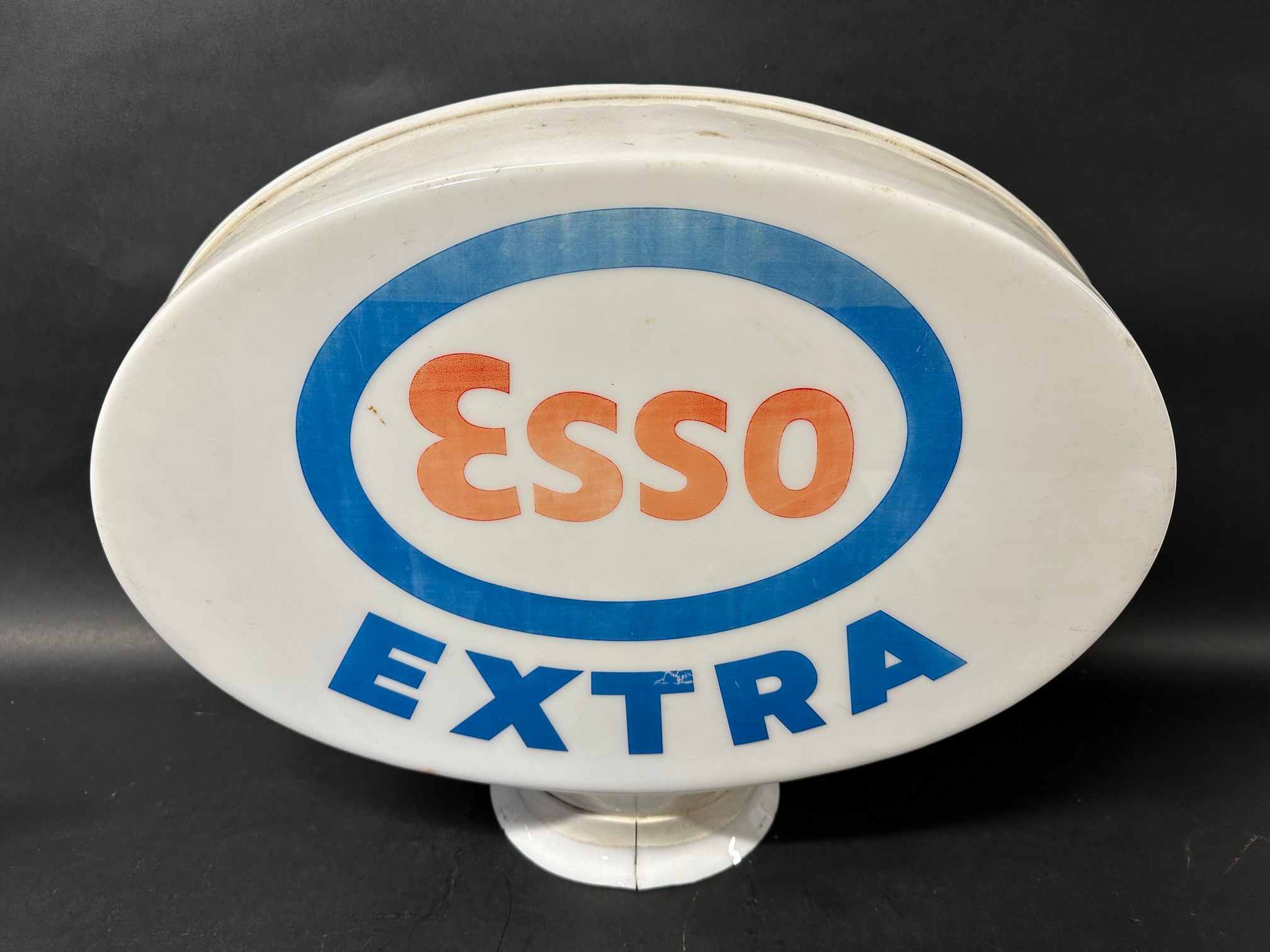 An Esso Extra plastic petrol pump globe.