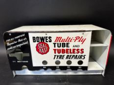 A Bowes Seal Fast hanging tyre repair dispensing cabinet with hinged front, 16 x 8 1/2".