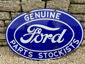 A Ford Genuine Parts Stockists double sided hanging enamel advertising sign, 35 3/4 x 23 3/4".