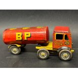 A Wells Brimtoy tinplate clockwork Albion style articulated petrol tanker with Shell Mex and BP Ltd.