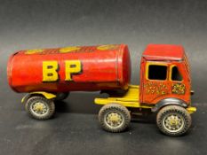 A Wells Brimtoy tinplate clockwork Albion style articulated petrol tanker with Shell Mex and BP Ltd.