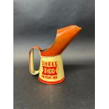 A Shell X-100 Motor Oil pint pourer.