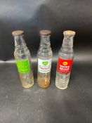 Three glass pint motor oil bottles: BP Energol (x2) and Shell X-100.