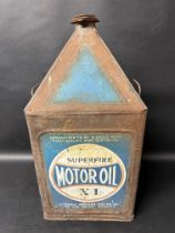 A Superfine Motor Oil five gallon pyramid can.