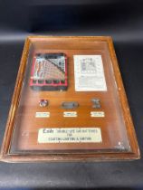 An oak display case for Exide Double Life Car batteries.