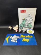 A Michelin Mr. Bibendum lot to include ashtrays, signs, a dish, figures etc.