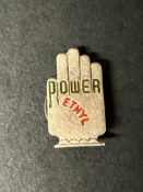 A Power Ethyl 'hand' badge by J.R.Gaunt, London, crescent shaped pin.