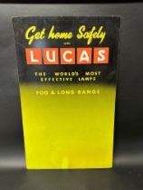 A Lucas hardboard advertising display for fog and long range lamps, 32 x 19 3/4".