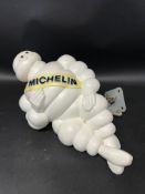 A Michelin Mr. Bibendum truck figure, 18" tall with adjustable fixing bracket for base, stamped 1966