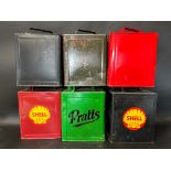 Six 2 gallon petrol cans of various ages and conditions, a Shell cap, a Pratts cap and four plain