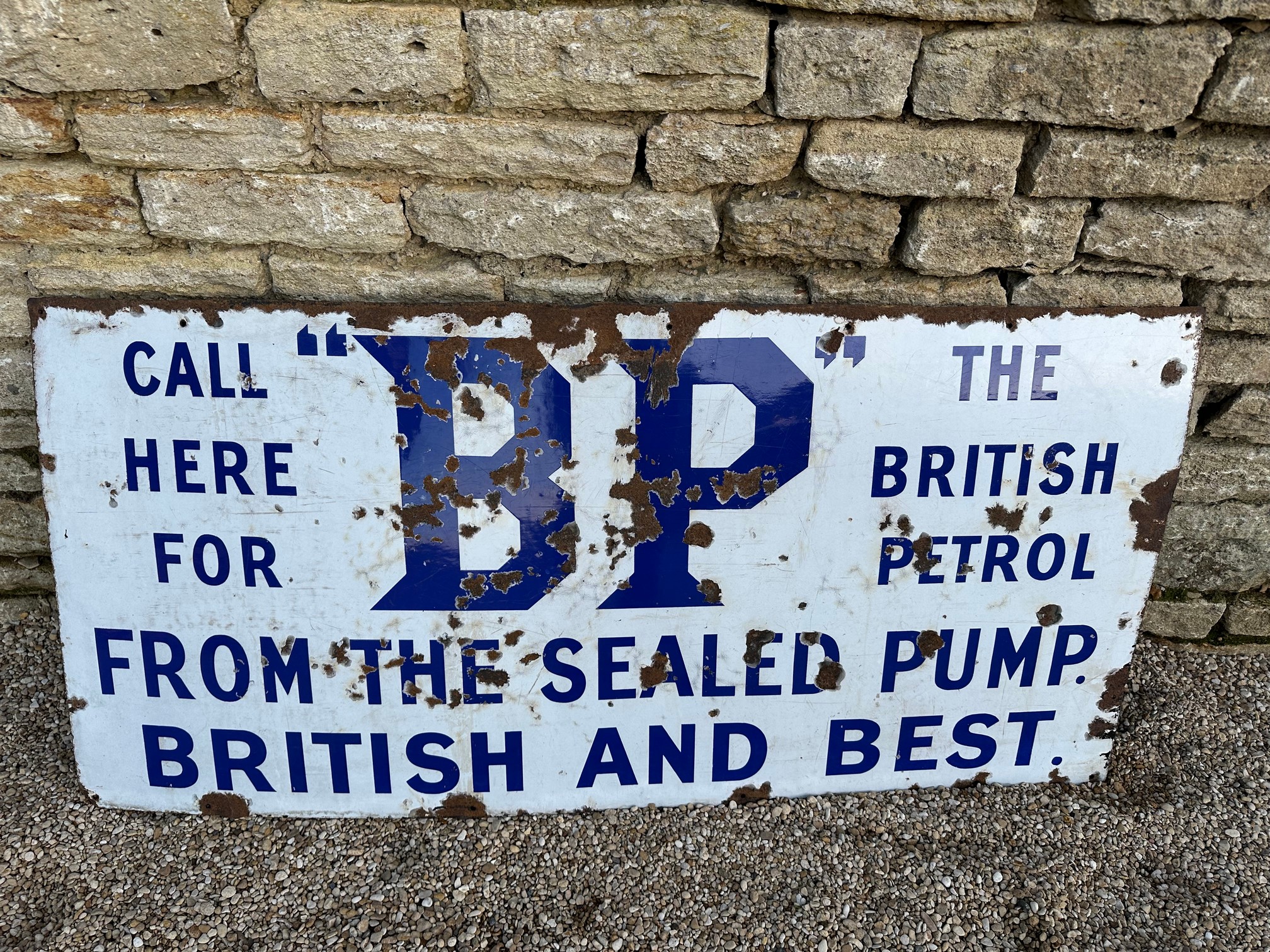 An early BP enamel advertising sign Call Here For "BP" The British Petrol From The Sealed Pump