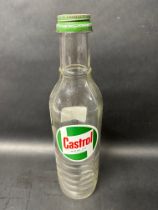 A Castrol Motor Oil quart bottle.