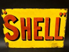 A Shell double sided enamel advertising sign by Bruton, London, lacking flange, 23 3/4 x 15".