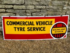 A large Dunlop Stock Commercial Vehicle Service enamel advertising sign by Wildman & Meguyer Ltd