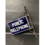 A Public Telephone double sided enamel sign on original bracket, enamel: 18 x 12", with frame 20 1/2