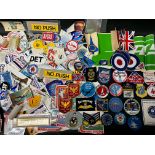 A collection of aviation related sew-on patches and stickers.