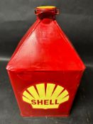 A restored pyramid top oil can with modern Shell decal to front.